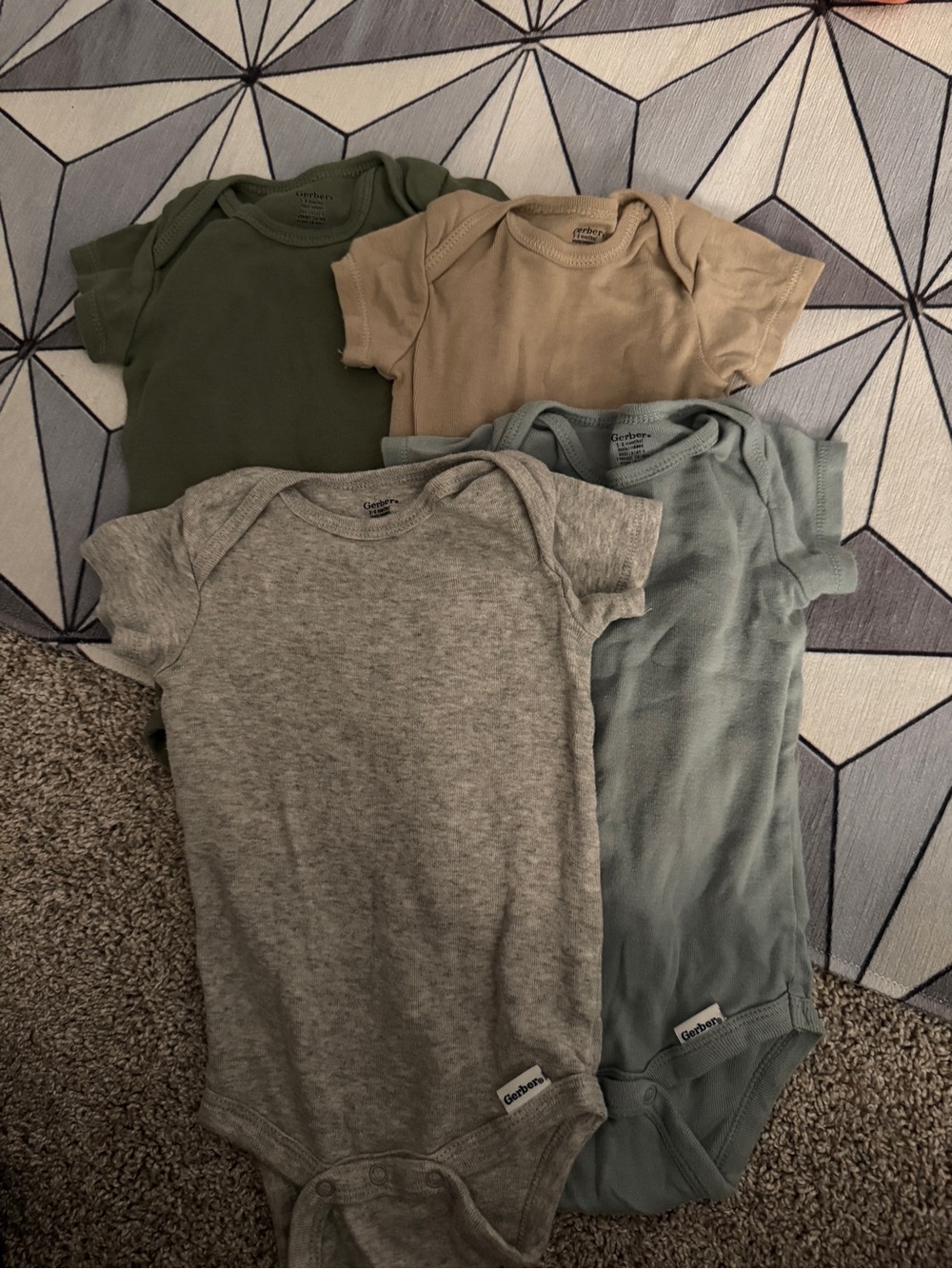 Set of four 3-6m gerber onesies